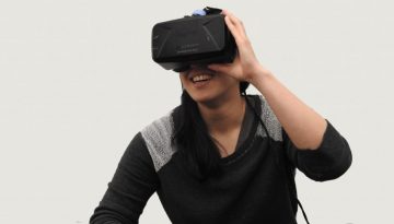Woman wearing VR goggles.